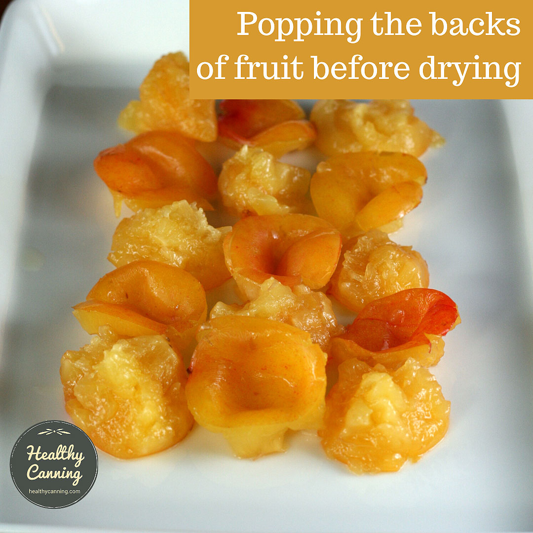 Popping the backs of fruit before drying
